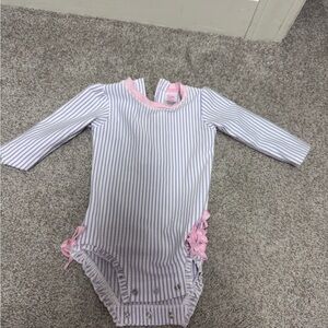 Ruffle Butts Purple and White Striped Bodysuit bathing suit with pink ruffles
